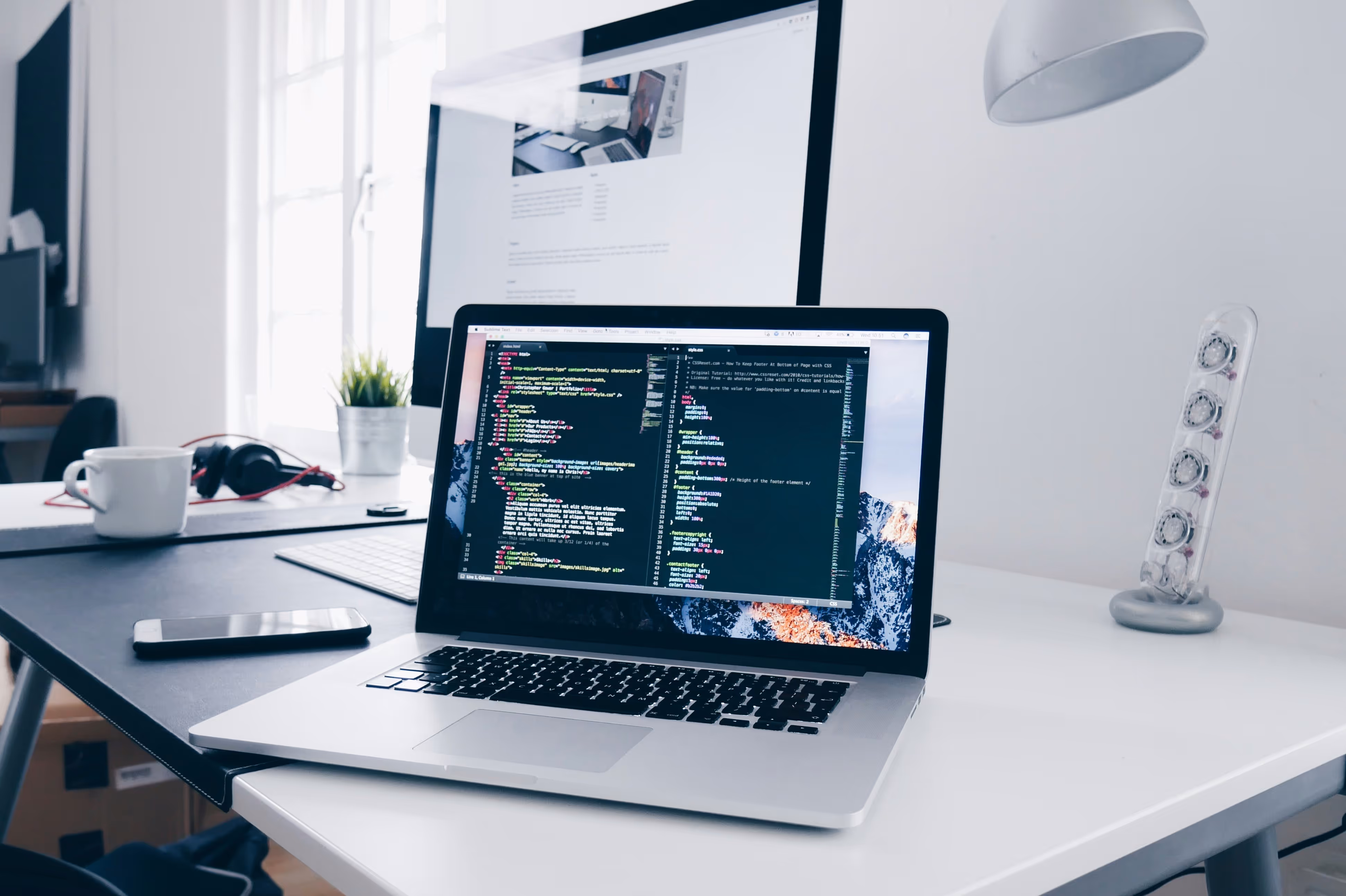 A clean desk with a laptop — drafting and optimizing content